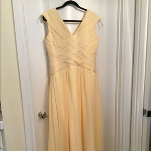 Brand new pale yellow gown.